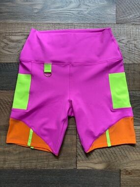 Peloton x Brittany Allen Pink Athletic Shorts with Neon Green & Orange Panels